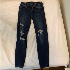 These are dark wash denim jeans.